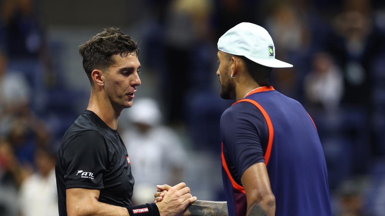 NEW YORK, NEW YORK – AUGUST 29: Nick Kyrgios (R) of Australia shakes hands with Thanasi Kokkinakis (L) of Australia after defeating him during the Men's Singles First Round on Day One of the 2022 US Open at USTA Billie Jean King National Tennis Center on August 29, 2022 in the Flushing neighbourhood of the Queens borough of New York City. (Photo by Elsa/Getty Images)