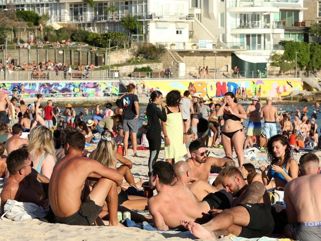 Beachgoers are seen at Bondi Beach despite the threat of Coronavirus. Picture: John Fotiadis