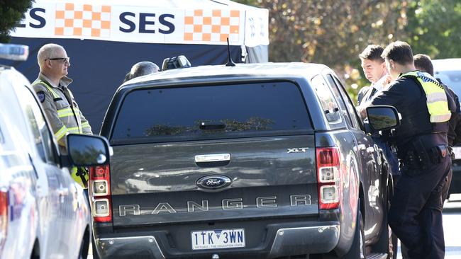 Emergency services investigate a suspicious death of a person at an early morning house fire at Conrad Street St Albans. Picture: Andrew Henshaw