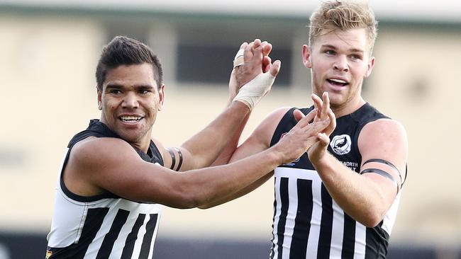 Port Adelaide’s Jake Neade celebrates a goal with Dan Houston on Saturday. Picture: Sarah Reed