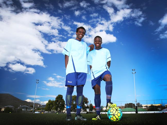 Hobart United Soccer Club players Shartiel Tuyishime of Moonah, left, and Lio Nduwayo of Old Beach, both 16, have been selected to represent Tasmania at a national tournament however now have to fundraise their way there. Both were born in a refugee camp in Tanzania after their families fled ethnic violence in Burundi. Picture: SAM ROSEWARNE.