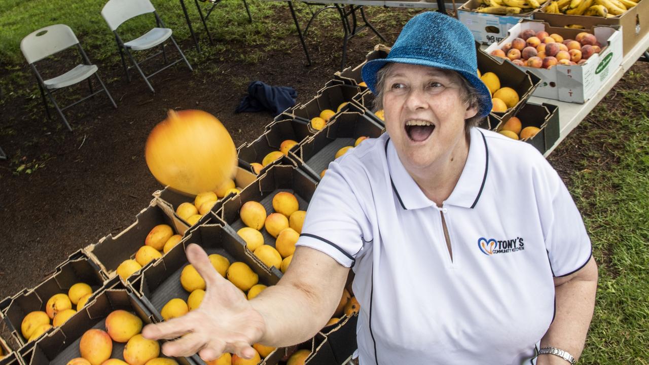 Tony's Community Kitchen volunteer Alison Hunter loves selling mangoes. Picture: Nev Madsen.