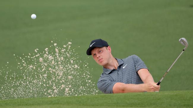 Australia’s Cam Davis blasts out of a bunker on the second hole during the first round of the Masters. Picture: Getty Images