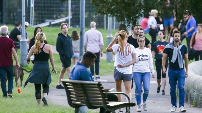 People gather in large groups at Rushcutters Bay on Friday in contravention of Prime Minister Scott Morrison’s message to the nation on Friday. Picture: Matrix