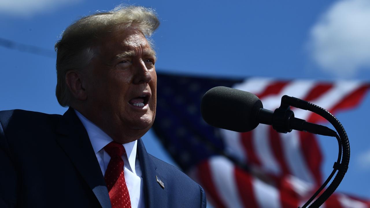 US President Donald Trump says he doesn’t want to see a big surge of coronavirus cases such as in New Zealand where 58 cases have been linked to the first community outbreak in months. Picture: Brendan Smialowski/AFP