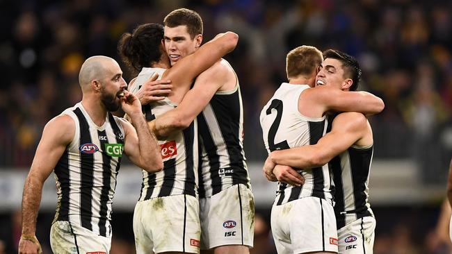 PERTH, AUSTRALIA - JULY 12: The Magpies celebrate the in on the final siren during the 2019 AFL round 17 match between the West Coast Eagles and the Collingwood Magpies at Optus Stadium on July 12, 2019 in Perth, Australia. (Photo by Daniel Carson/AFL Photos via Getty Images)