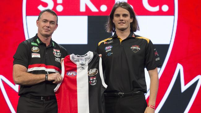 Hunter Clark is welcomed to St Kilda by coach Alan Richardson.