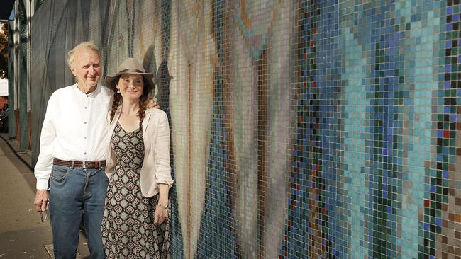 Actor Essie Davis and her father George Davis in front of his iconic mural on the former Hobart Conservatorium of Music building.