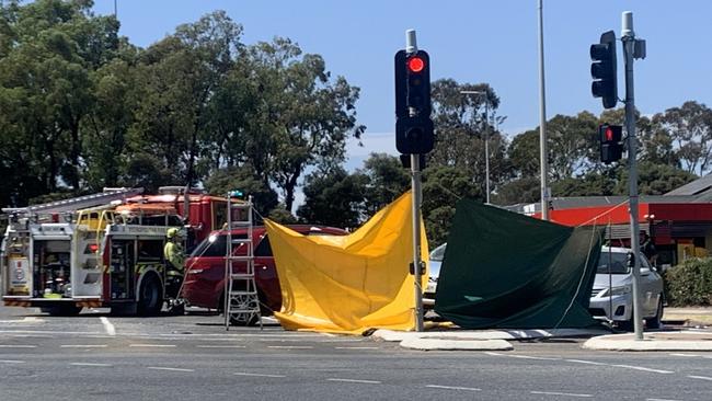 Emergency services put up a screen around the crash at Golden Grove on Wednesday. Picture: George Yankovich