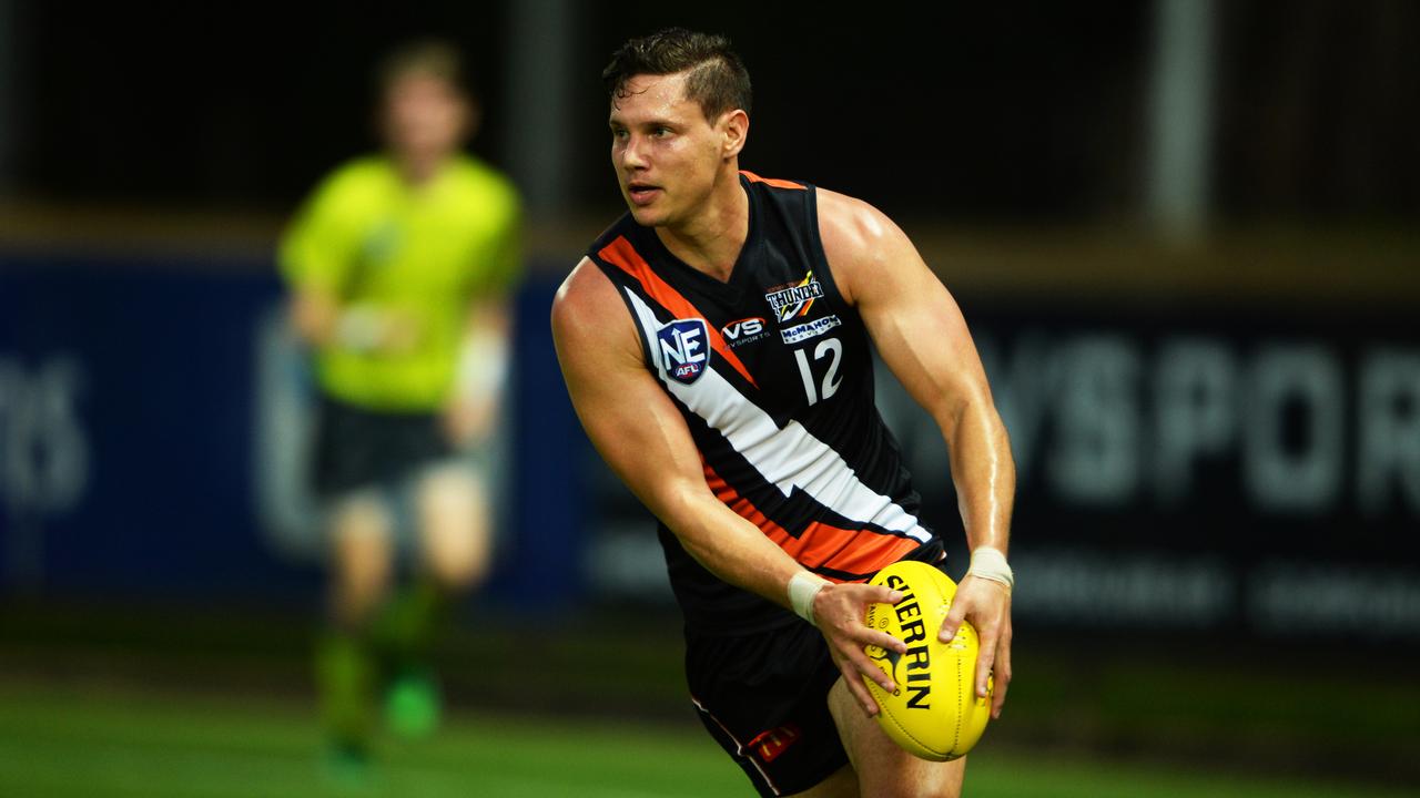 Jonathon Peris makes a run with the ball down field in the NT Thunder colours.