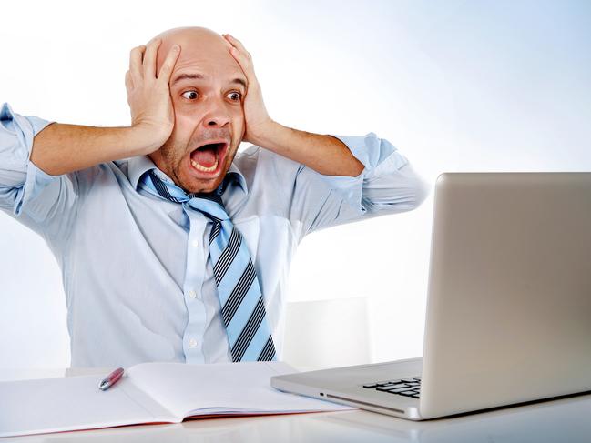 Stressed person using computer. Picture: iStock.