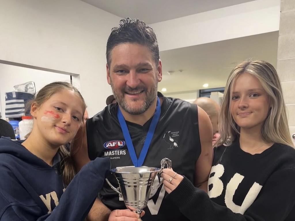 This was supposed to be Fevola’s last game, seen here with daughters Leni and Lulu.