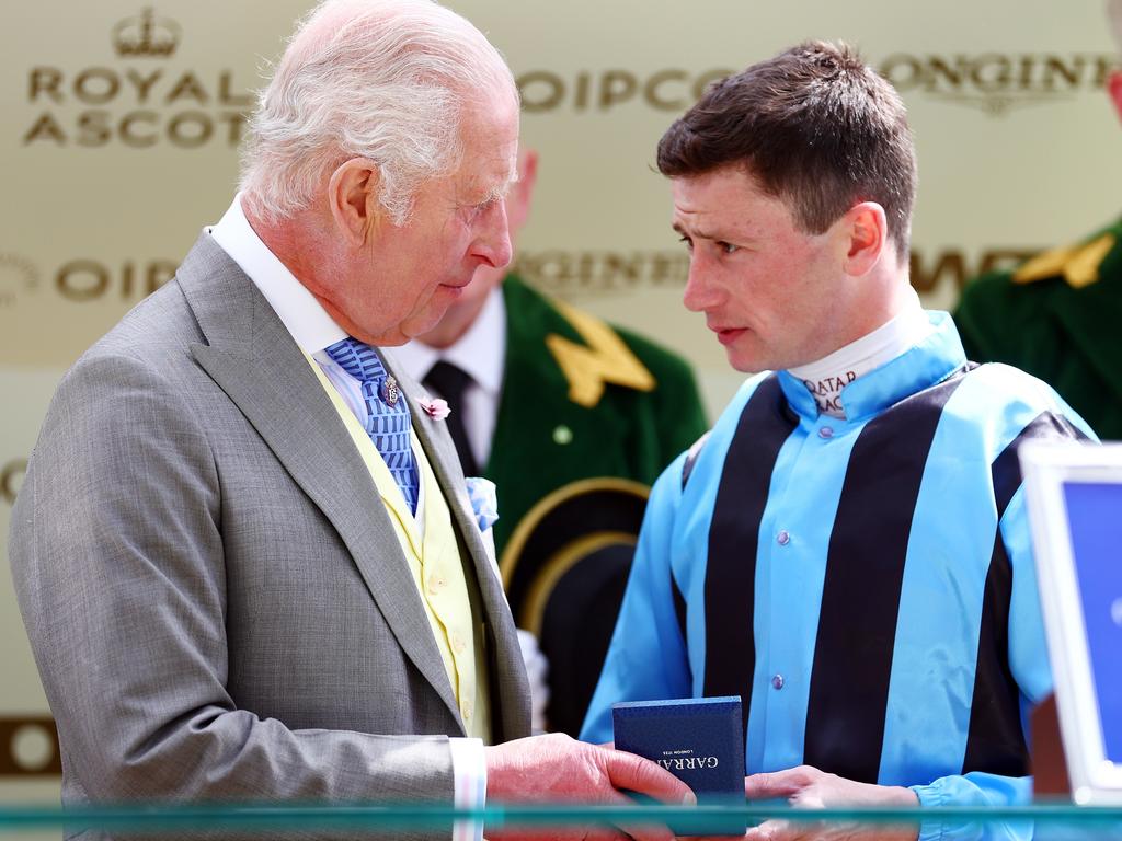 King Charles III chats with jockey Oisin Murphy after he won the King Charles III Stakes during Royal Ascot 2024 after he rode Australian-trained horse Asfoora at Ascot Racecourse. Picture: Bryn Lennon/Getty Images