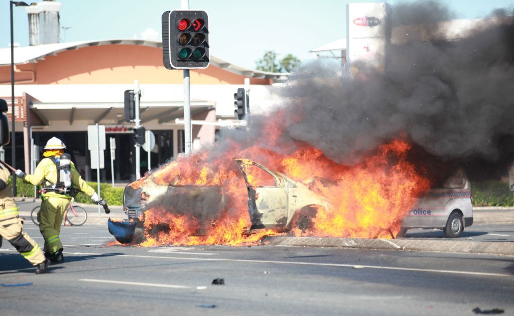 A car caught on fire after hitting a traffic pole on the corner of Musgrave and High Sts on Sunday. Picture: Contributed