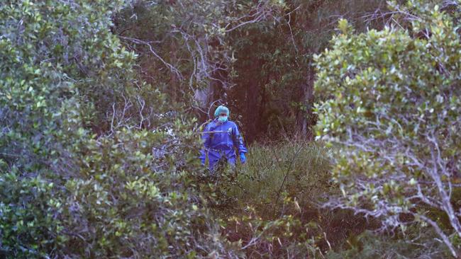 Police investigate a crime scene and at Martin Sheils Park in Tallebudgera . Police Forensics take photos with cameras and drones of the crime scene. Picture Glenn hampson