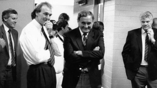 Leigh Whicker, Graham Cornes, Bob Hammond and Bill Sanders in the Crows changerooms..