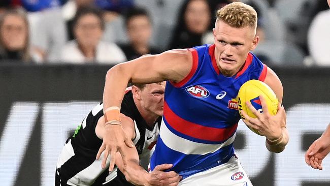 Adam Treloar was squeezed out of Collingwood due to salary cap issues.