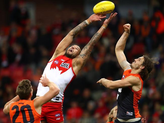 Franklin reaches for a mark in front of Giants defender Phil Davis. Picture: Getty Images