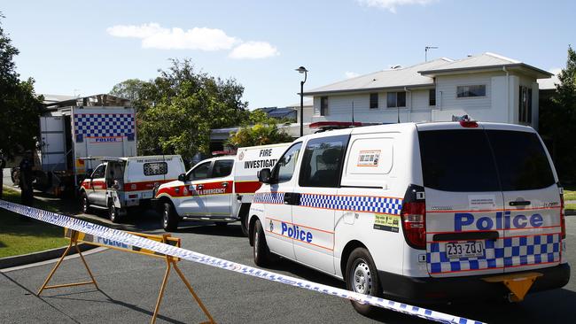 Investigations get underway at the property after a 21-year-old man was found dead inside. Picture: Tertius Pickard