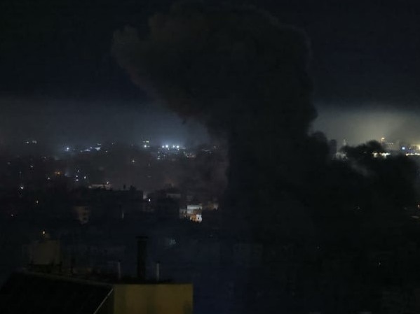 Smoke rose from the site of an Israeli airstrike in Beirut's southern suburbs on Friday. (Ibrahim Amro/Agence France-Presse/Getty Images)