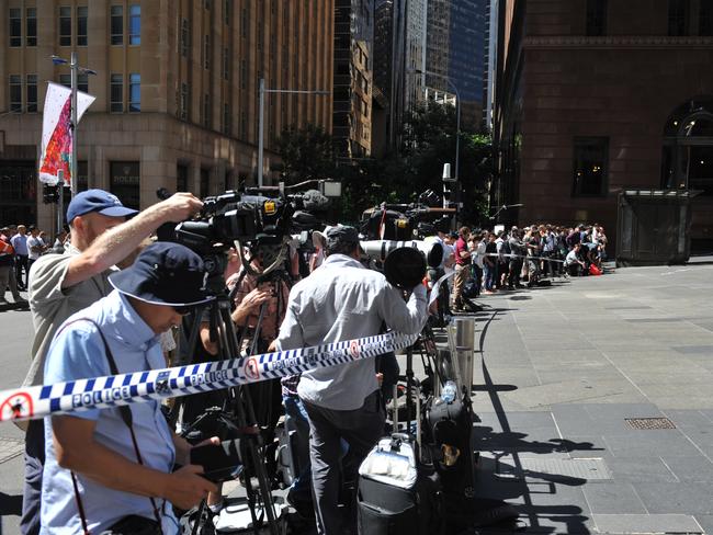 A large media contingent with their lenses pointed towards the Lindt Chocolate Cafe near Martin Place, Sydney,. Picture: Joel Carrett