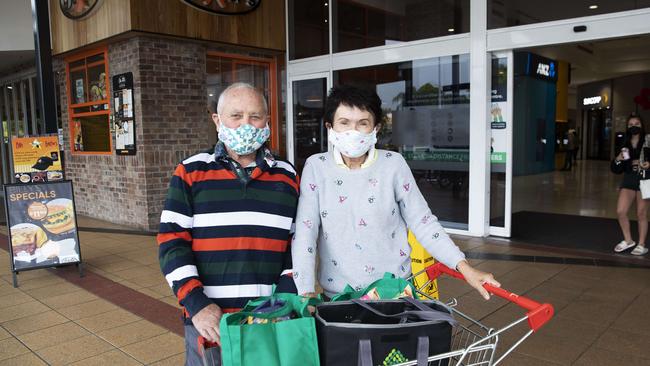 John and Julianne Hosking-Potts posing after shopping at Toombul Shopping Centre on the first day of the three-day lockdown. Picture: Attila Csaszar