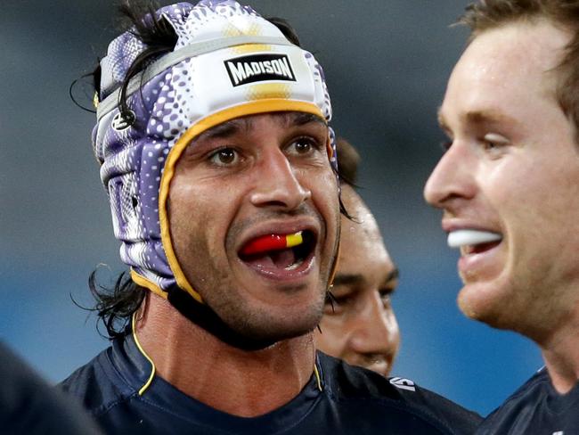 Cowboy's Johnathan Thurston celebrates Jake Granville try during the round 6 NRL game between the South Sydney Rabbitohs and the North Queensland Cowboys at ANZ Stadium.Picture Gregg Porteous