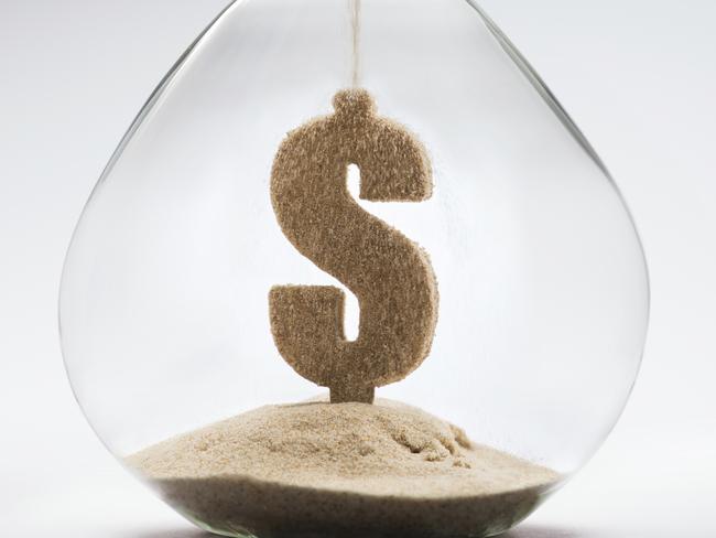 Moneysaver Time is money concept with falling sand taking the shape of a dollar, tax, money, time