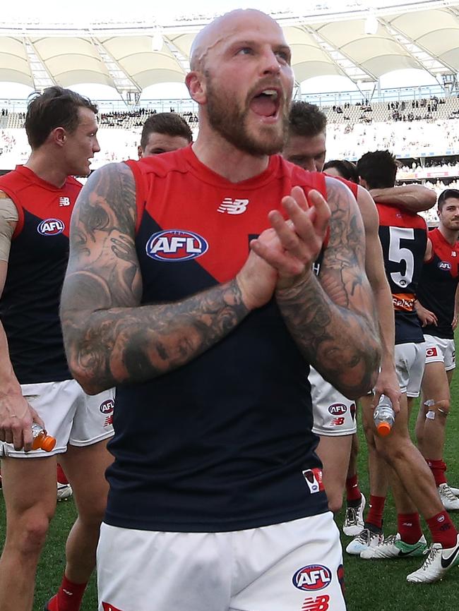 Jones leads his team off the ground, with a finals berth secured. Picture: Getty