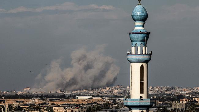 Smoke billowing during an Israeli bombardment over Khan Younis in the southern Gaza Strip on Saturday, seen from Rafah. Picture: Said Khatib/AFP