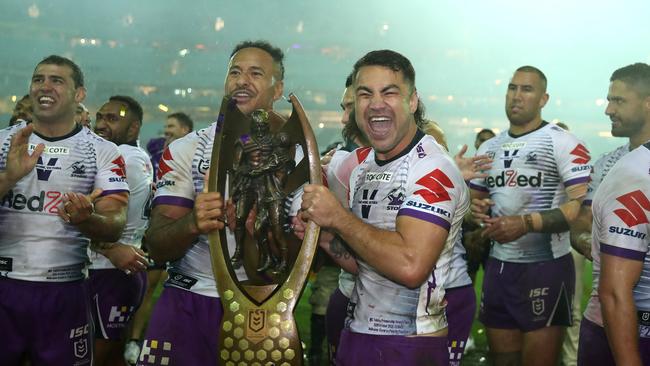 SYDNEY, AUSTRALIA - OCTOBER 25:  Jahrome Hughes of the Storm poses with the Premiership trophy after winning the 2020 NRL Grand Final match between the Penrith Panthers and the Melbourne Storm at ANZ Stadium on October 25, 2020 in Sydney, Australia. (Photo by Cameron Spencer/Getty Images)