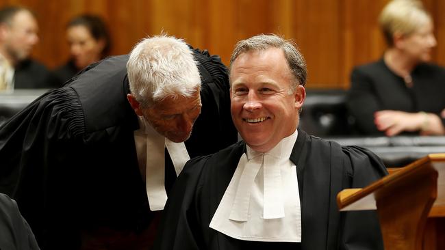 Lawyer Guy Abel has a chat with Attorney-General and Premier Will Hodgman before new Supreme Court judge Gregory Geason’s swearing in ceremony Picture: SAM ROSEWARNE