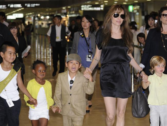 Angelina Jolie (2R), accompanied by her children Maddox (L), Zahara (2L), Pax (3L) and Shiloh (R). Picture: AFP