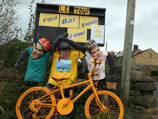 ADDINGHAM, ENGLAND - JULY 03: Mark Cavendish, Bradley Wiggins and Chris Froome figures are seen prior to the 2014 Le Tour de France Grand Depart on July 3, 2014 in Leeds, United Kingdom. (Photo by Bryn Lennon/Getty Images)