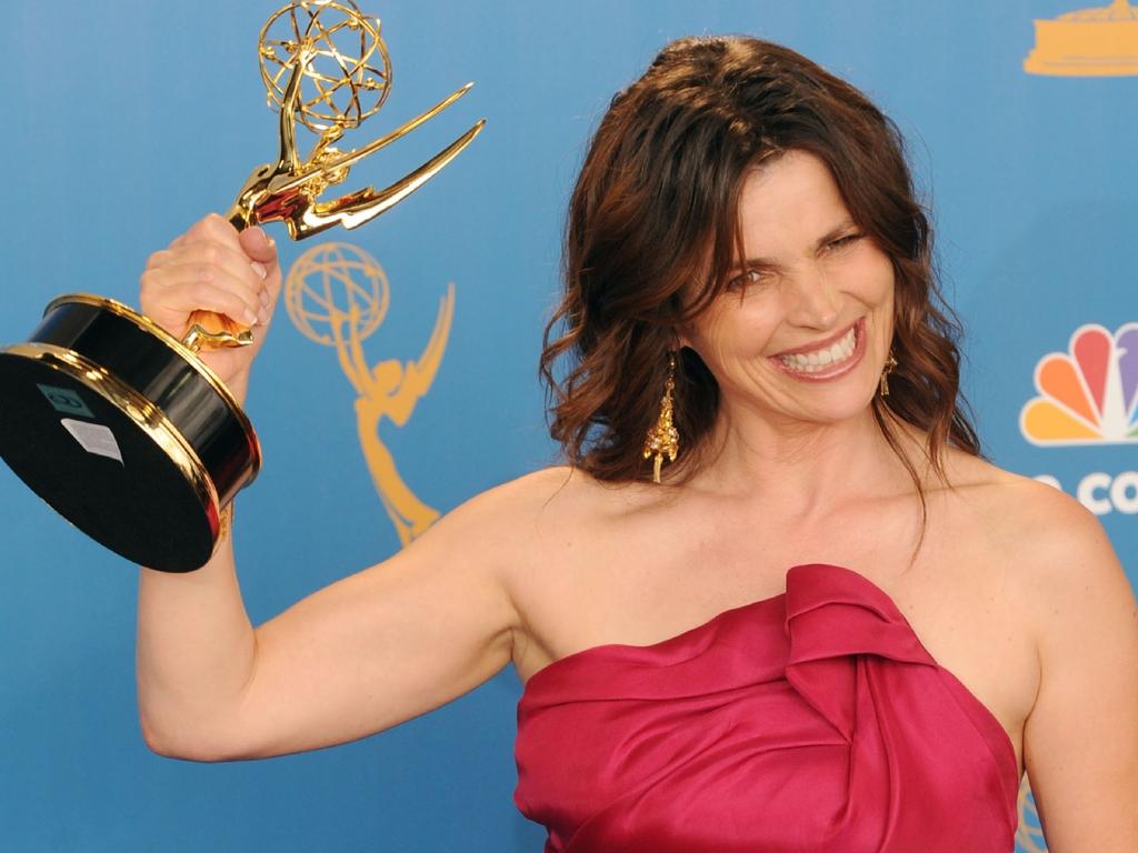 Julia Ormond, with her Golden Globe in 2010, is taking on Hollywood over Harvey Weinstein. Picture: Getty Images/AFP