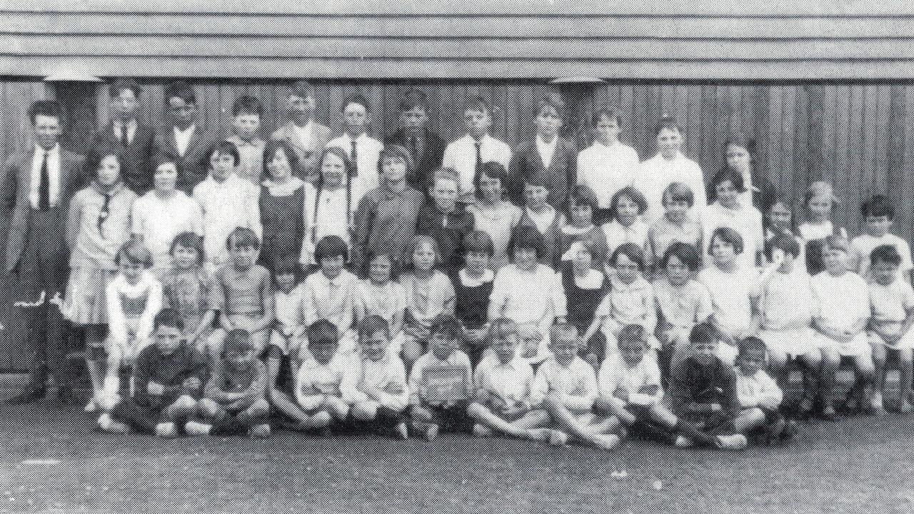 Jondaryan State School 1928 class photo. Back: Mr Charles Bauer (Principal) Frank Borger, Thos Masters, Michael Mackey, Clarence (Clarrie) Evans, Robert Chicken, Patrick (Dick) White, Colin Cottle, John Tattam, Kevin Brideson, Victor Jacob, Mary Annie Flanagan (Pupil Teacher). 3rd Row: Gwen Millard, Theresa Huxham, Alice Ladner, Vera Cockburn, Enid Evans, Elizabeth (Beth) Evans, Lavina Gray, Monica Huxham, __, __, __, __, Thelma Duffin, Vera Evans, Doris Evans, Edna McLoughlin. 2nd Row: Stella Evans, Ivy May Jacob, Anastasia McLoughlin, Ruby Osmond, Beryl Enid Millard, Dorothy (Dory) Jacob, Dorothy (Dot) Wicks, Stella Brideson, Sylvia Adelaide (Ade)Cockburn, __, __, Kitty Brideson, Mavis Millard, Gwen Millard, __, Frances McLoughlin. Front: Robert Dixon, __, Sydney Masters, Alexander (Jack) Gray, Leonard Wicks, Leonard Coombs, Edward Osmond, Robt Evans, Bernard White, Francis McLoughlin. Monday, August 29, 2022. Picture: supplied