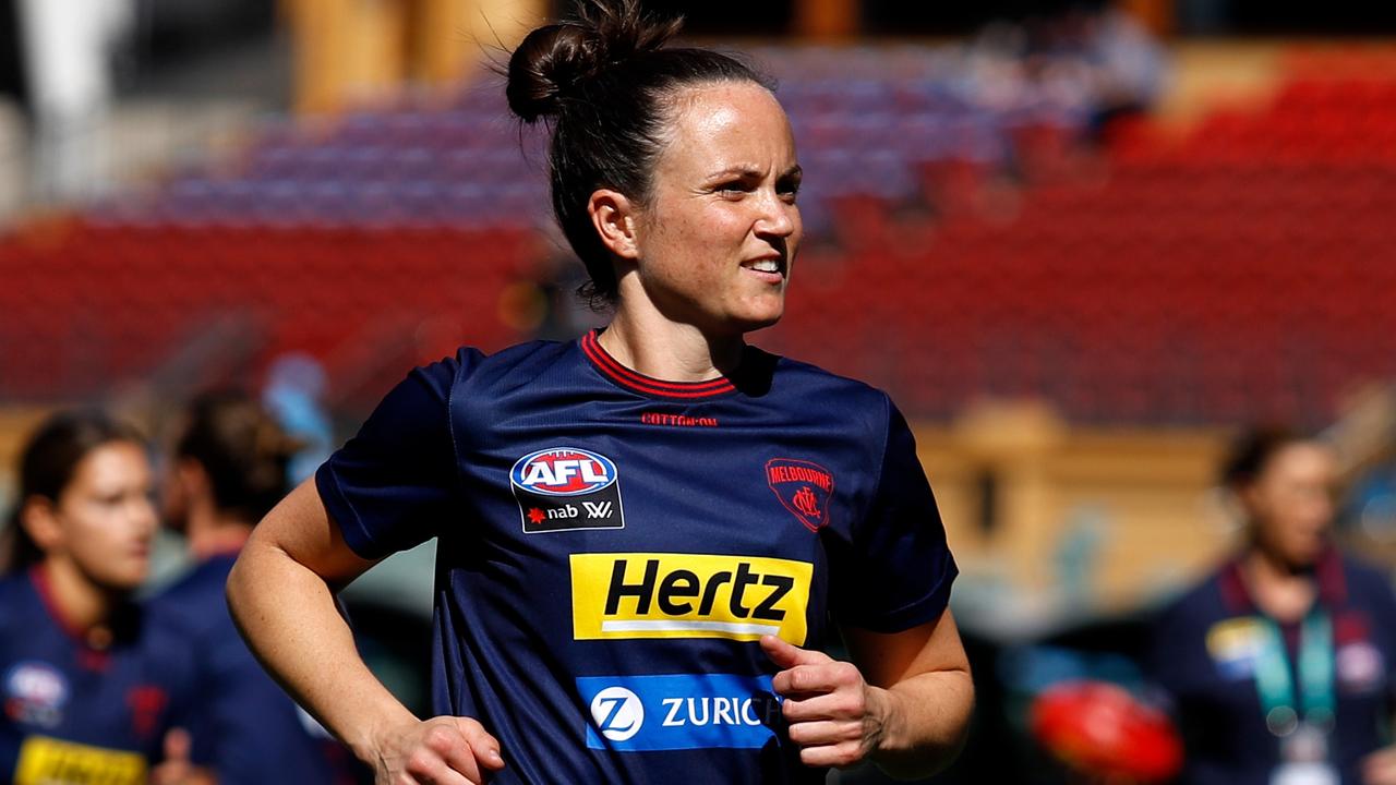 Daisy Pearce leads the Demons out onto Adelaide Oval.