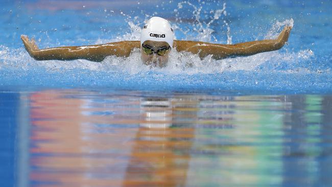 Yusra Mardini, swimming for the Refugee Olympic Team, competes in a women's 100m butterfly heat.