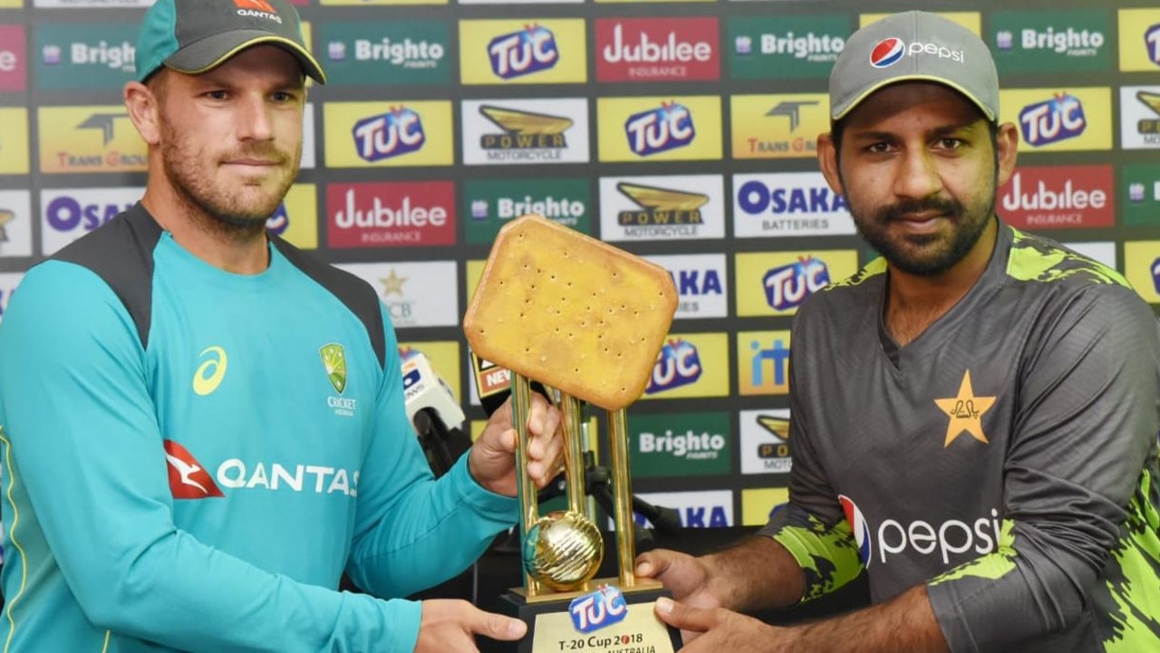 Aaron Finch and Sarfraz Ahmed pose with the 2018 TUC Cup (Source: PCB).