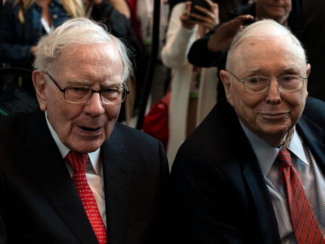 Warren Buffett (L), CEO of Berkshire Hathaway, and vice chairman Charlie Munger attend the 2019 annual shareholders meeting in Omaha, Nebraska, May 3, 2019. (Photo by Johannes EISELE / AFP)