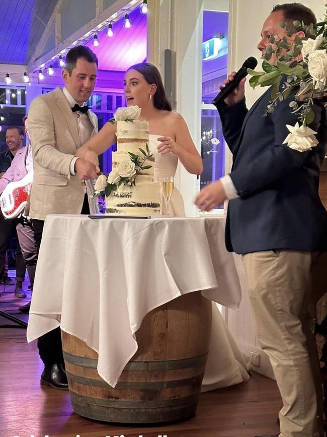 Newlyweds Mitchell and Madeline Gaffney cut their wedding cake. Picture: Instagram