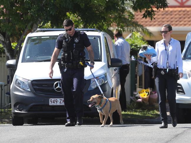 Police at the crime scene at Hemlock Court, Narangba.