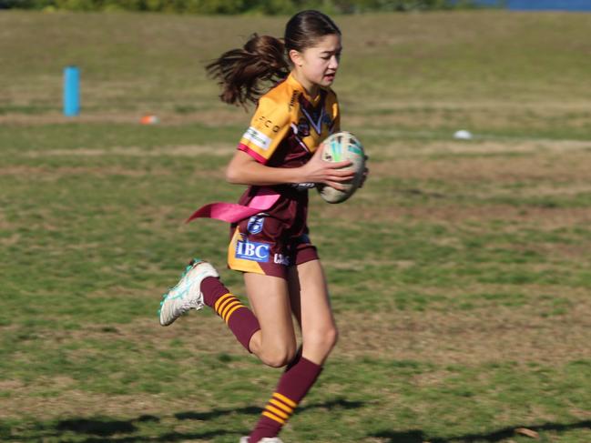 Emma Lim of the Holy Cross Rhinos U12s Blue Tag. Picture: David Curry
