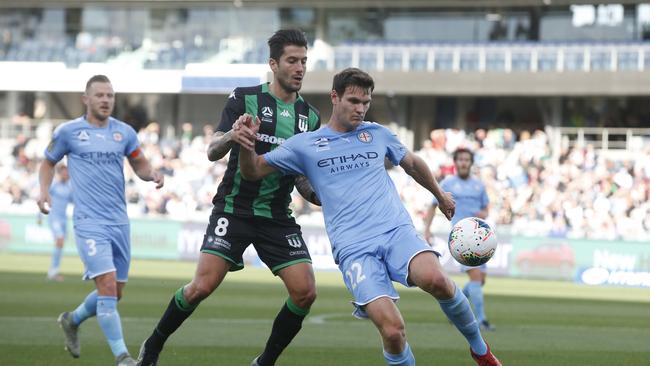 Curtis Good holds off Western’s Panagiotis Kone earlier this year. Picture: Alan Barber