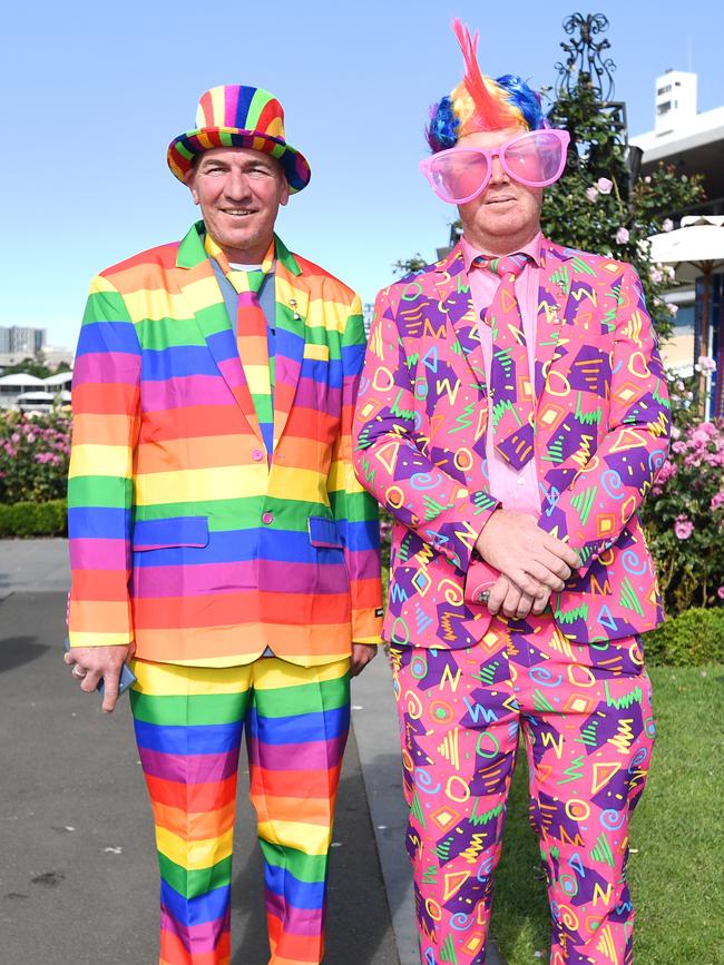 Two colourful racegoers make a splash. Picture: AAP Image/Erik Anderson