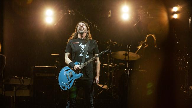 Dave Grohl when he first took the stage in Geelong on Friday, laughing in elation at the sight of a stadium full of fans. Picture: Brett Schewitz / Frontier Touring