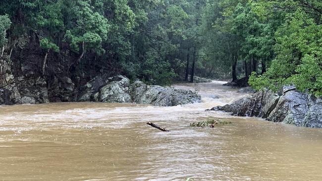 A flooded Currumbin Creek on Queensland’s Gold Coast. Picture: Scott Powick