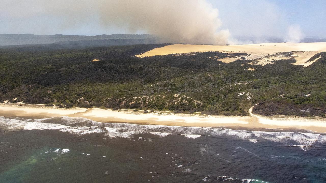 Over 50 per cent of Fraser Island has been scorched as a massive bush fires continue to consume the island. Pic: Sarah Marshall