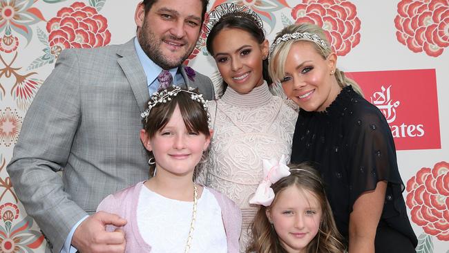 Brendan and Alex Fevola with their children Leni, Mia and Lulu. Picture: Julie Kiriacoudis