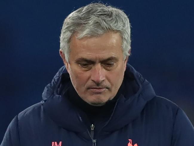 Tottenham Hotspur's Portuguese head coach Jose Mourinho reacts during the English FA Cup fifth round football match between Everton and Tottenham Hotspur at Goodison Park in Liverpool, north west England on February 10, 2021. (Photo by Clive Brunskill / POOL / AFP) / RESTRICTED TO EDITORIAL USE. No use with unauthorized audio, video, data, fixture lists, club/league logos or 'live' services. Online in-match use limited to 120 images. An additional 40 images may be used in extra time. No video emulation. Social media in-match use limited to 120 images. An additional 40 images may be used in extra time. No use in betting publications, games or single club/league/player publications. /